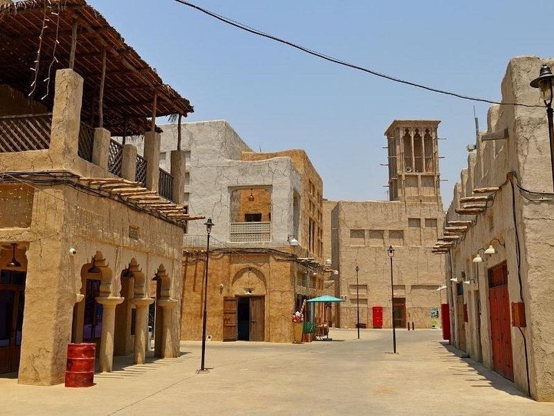 Wind towers and coral-stone lanes in the Al Fahidi historical quarter of Bur Dubai