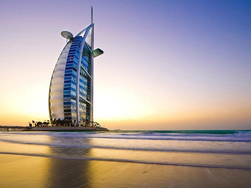 The Burj Al Arab on its island off Jumeirah Beach at sunset