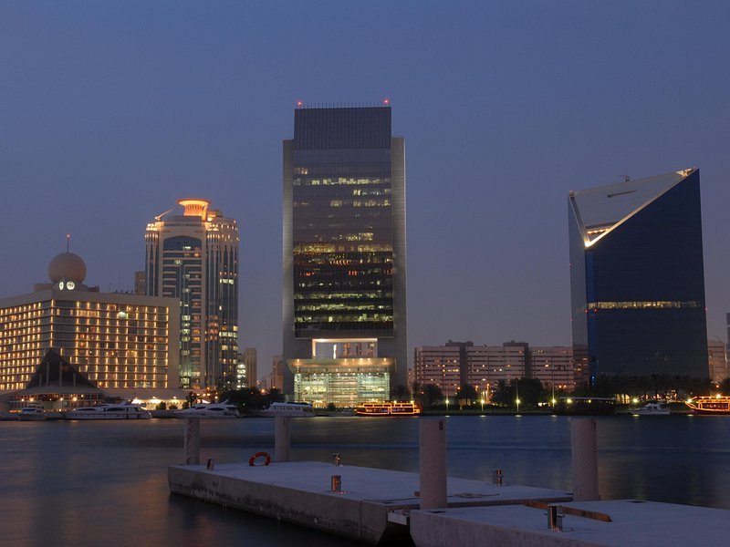 Dubai Creek at dusk, looking across the water to the towers of Deira